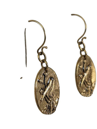 R gold over bronze crystal bird earrings retails $150