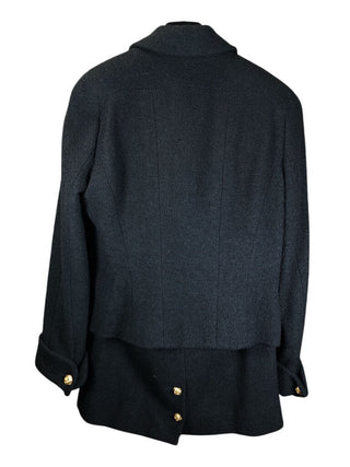 2 pc skirt suit boucle ' wool silk lined cloverleaf lapel gold cloverleaf button doublebreasted front ,wrists and 2 pockets skirt back zip 2 buttons at back slit