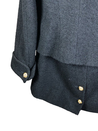 2 pc skirt suit boucle ' wool silk lined cloverleaf lapel gold cloverleaf button doublebreasted front ,wrists and 2 pockets skirt back zip 2 buttons at back slit