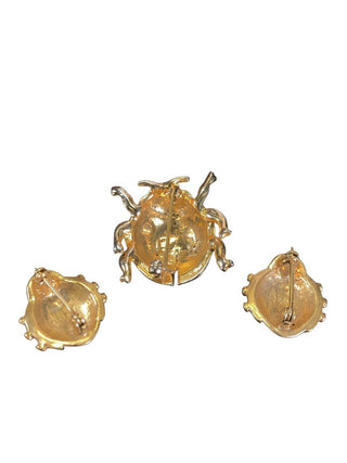set of three lady bug brooches