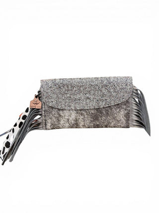 Embossed fringed cowhide wristlet