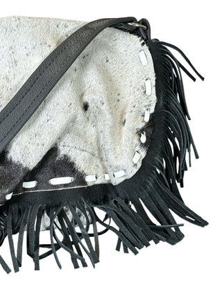Whipstitch cowhide w/leather fringe