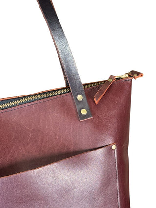 Zip top leather shoulder bag