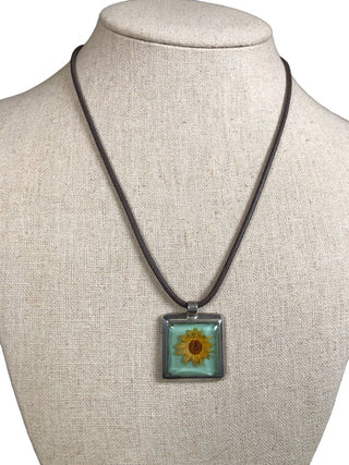 R Sterling flower pendant on cord